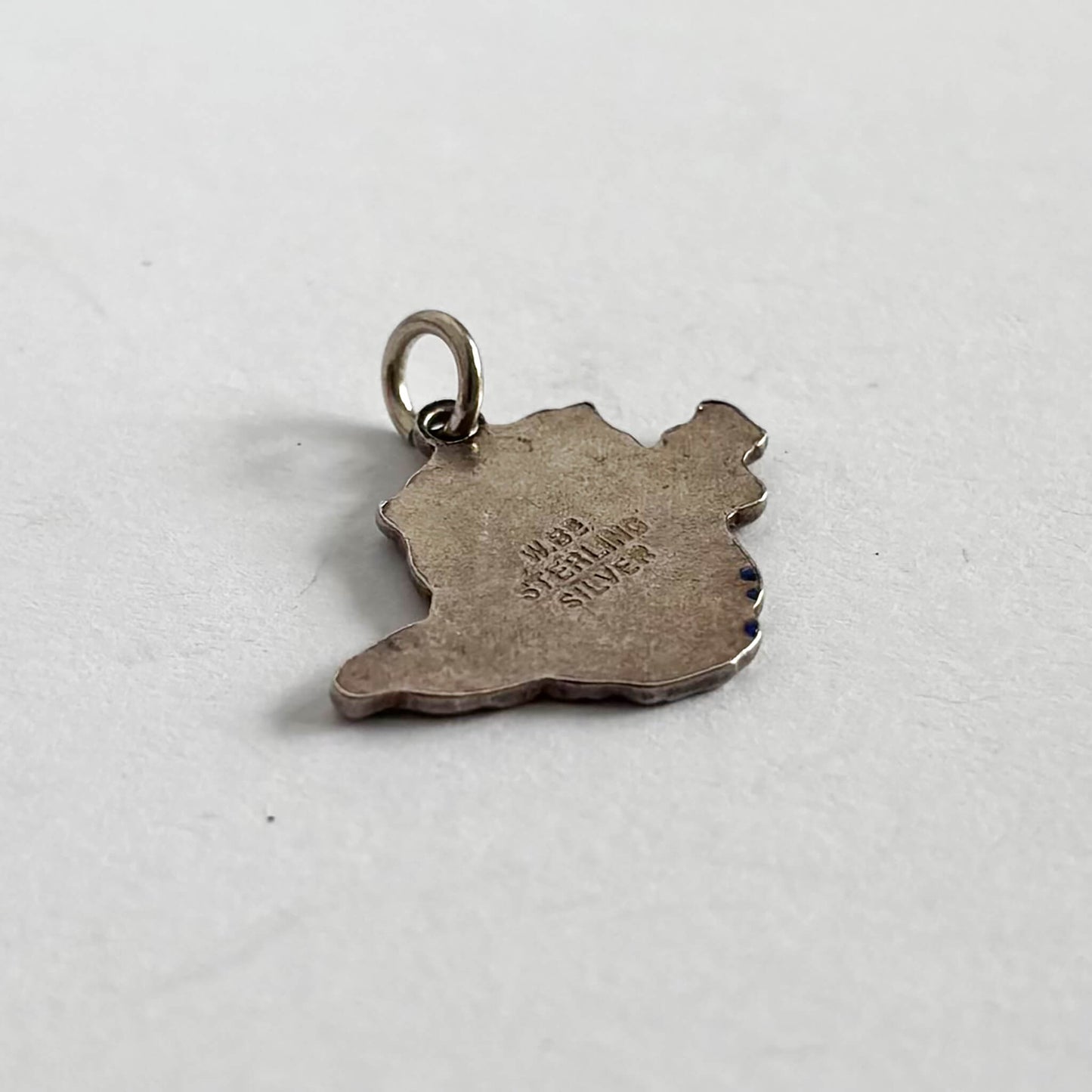 Anglesey map charm in sterling silver blue and enamel