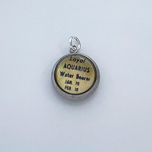 Vintage Essex Crystal Intaglio Charm Aquarius Zodiac Pendant from Charmarama Charms