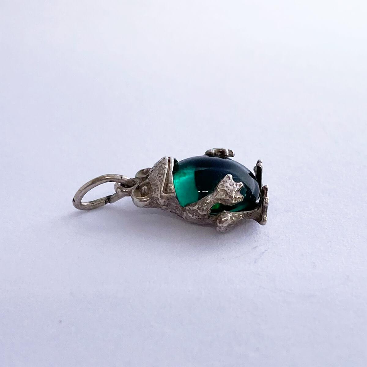 Vintage silver frog charm with green crystal belly