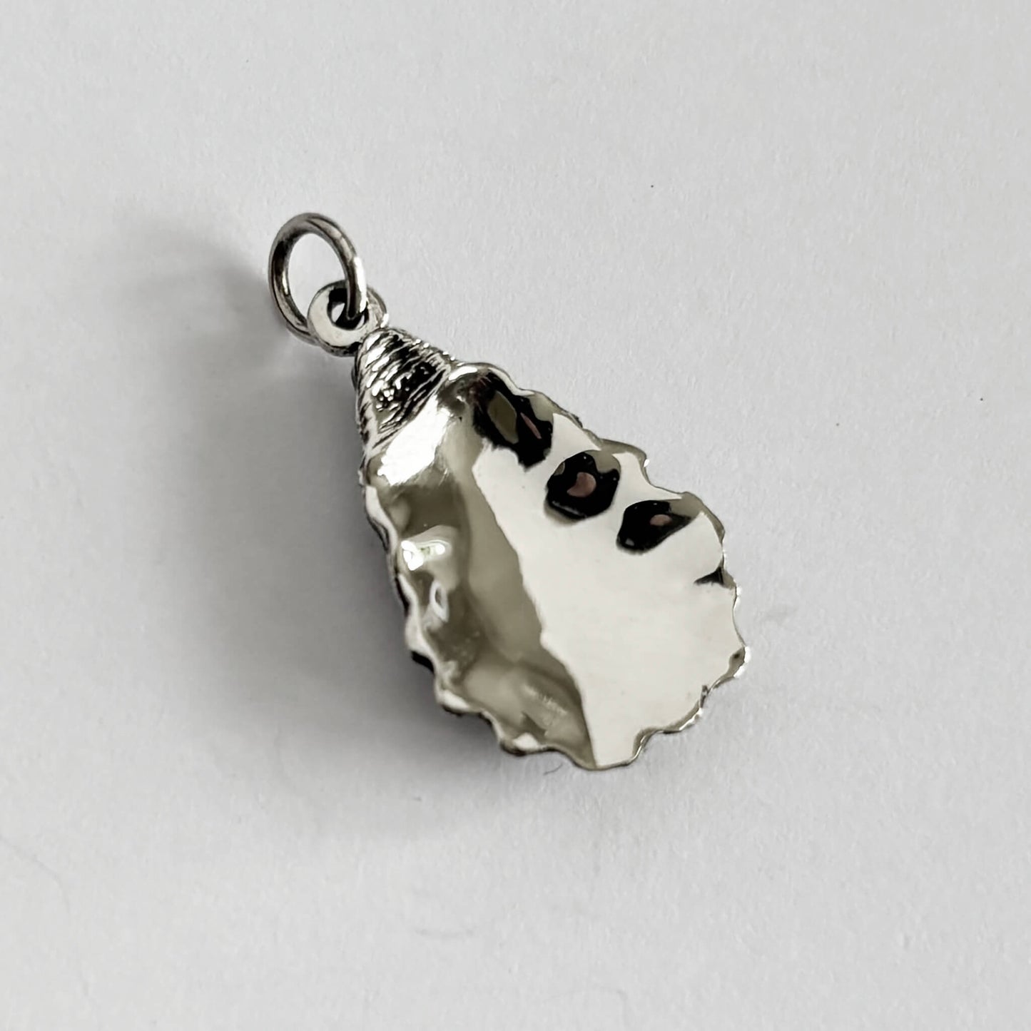 Sterling silver oyster shell charm reverse side