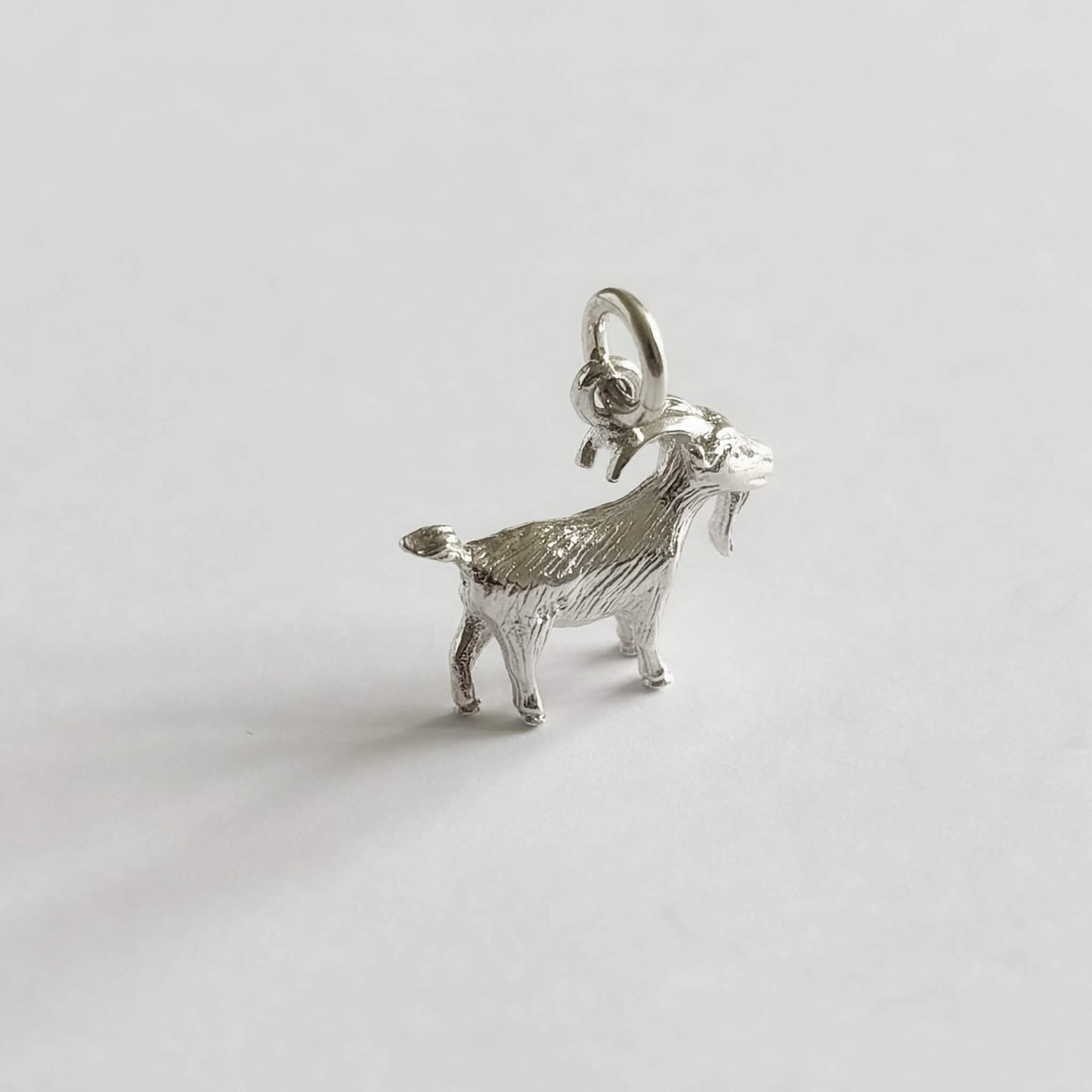 Goat charm in sterling silver