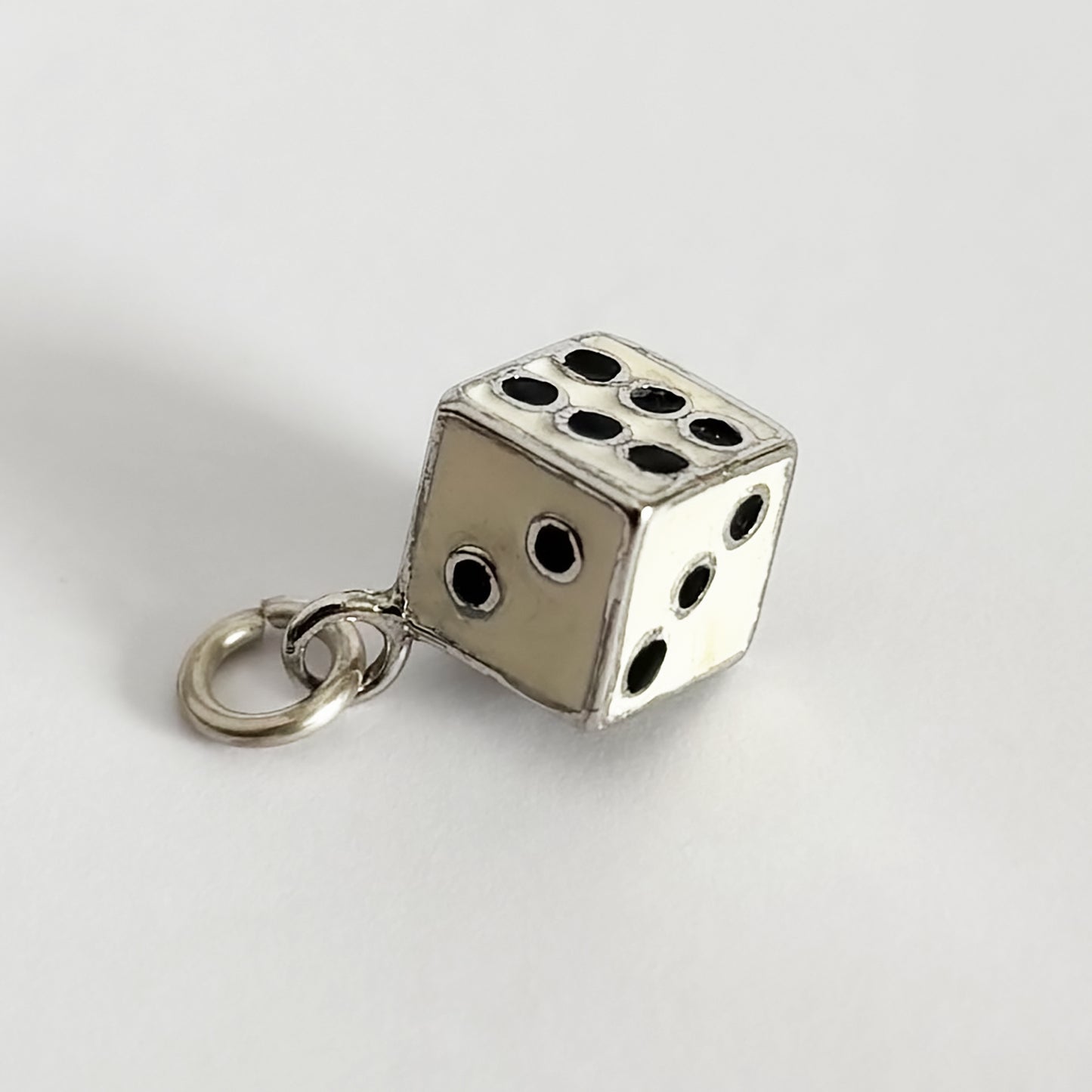 Vintage dice pendant in sterling silver white enamel with black dots