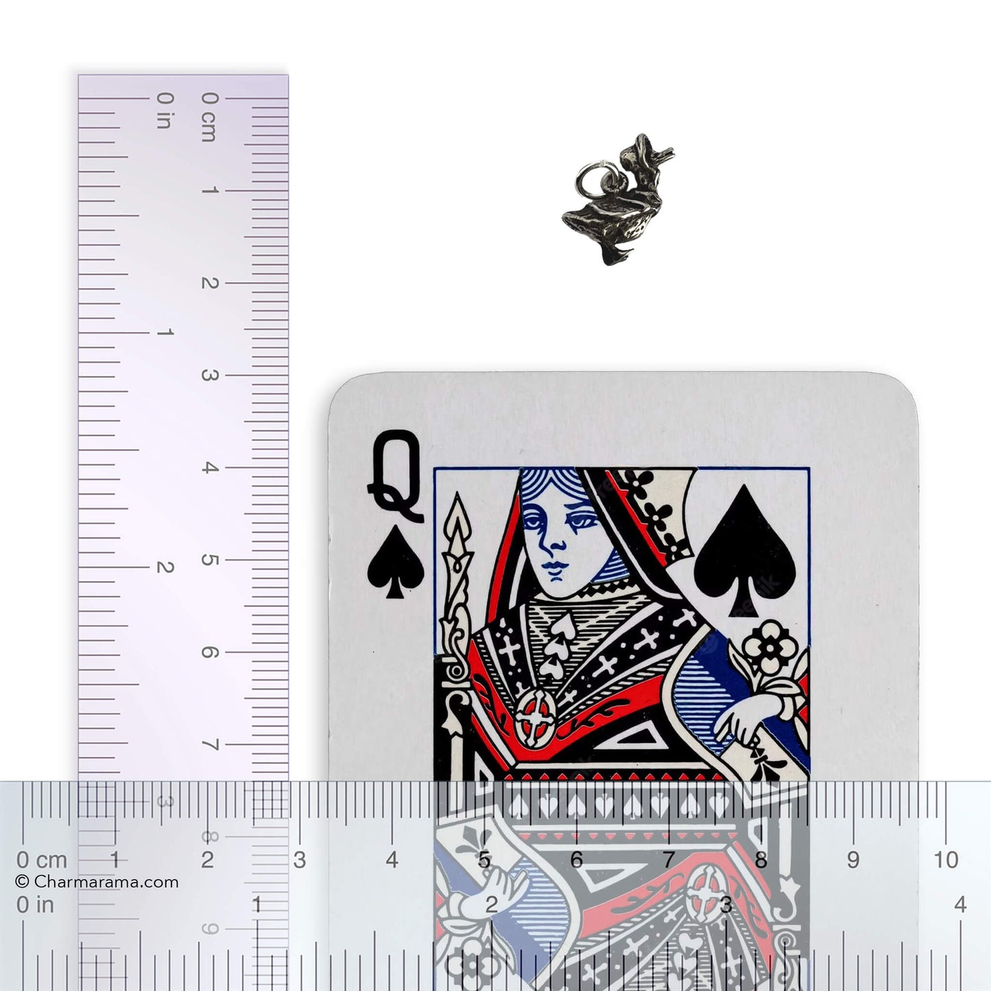 Jemima Puddle-Duck charm with playing card a ruler for scale on a white background