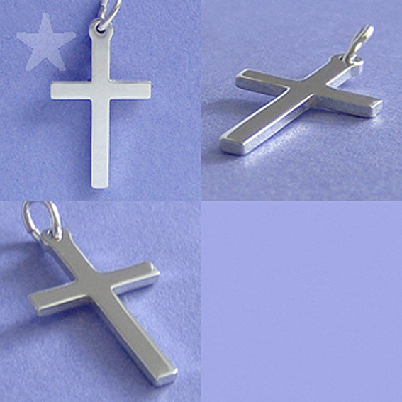 Three silver cross pendants on a light purple background