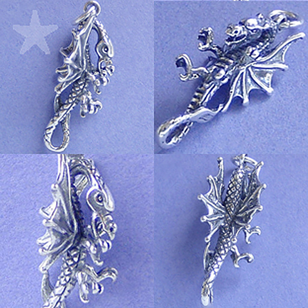 Four silver dragon pendants on a light purple background