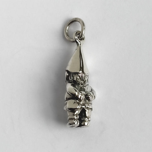 Silver gnome pendant on a white background