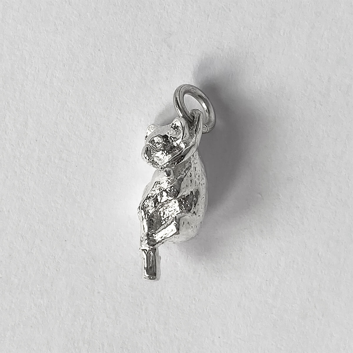 Koala on branch charm in sterling silver