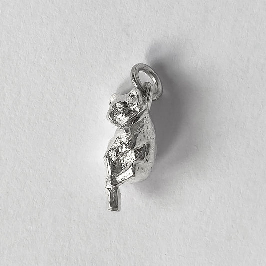 Koala on branch charm in sterling silver