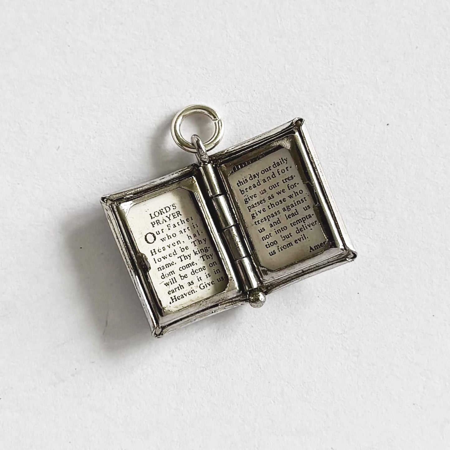 bible charm vintage sterling silver, opens to Lord's Prayer