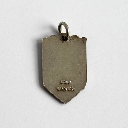 Silver pendant with '925 Silver' stamp on a white background