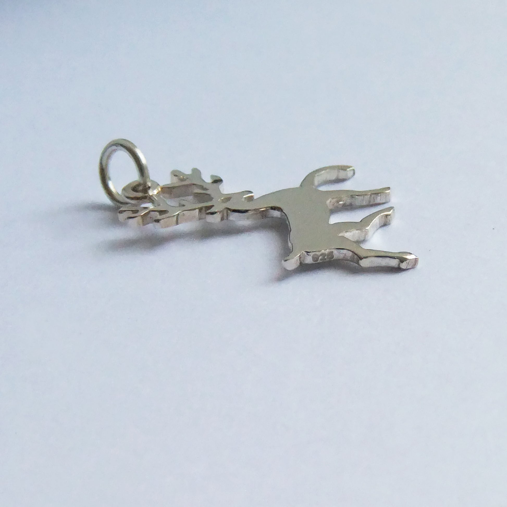 reindeer silhouette charm