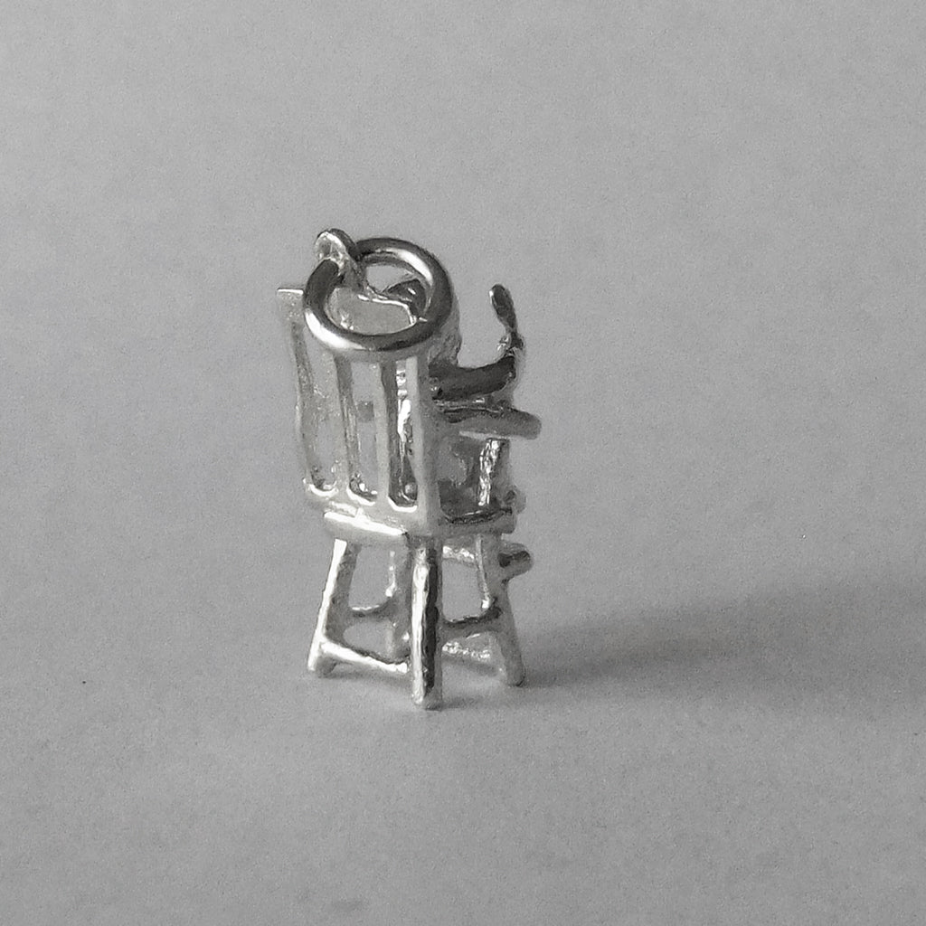 Moving Baby in High Chair Charm Sterling Silver Pendant