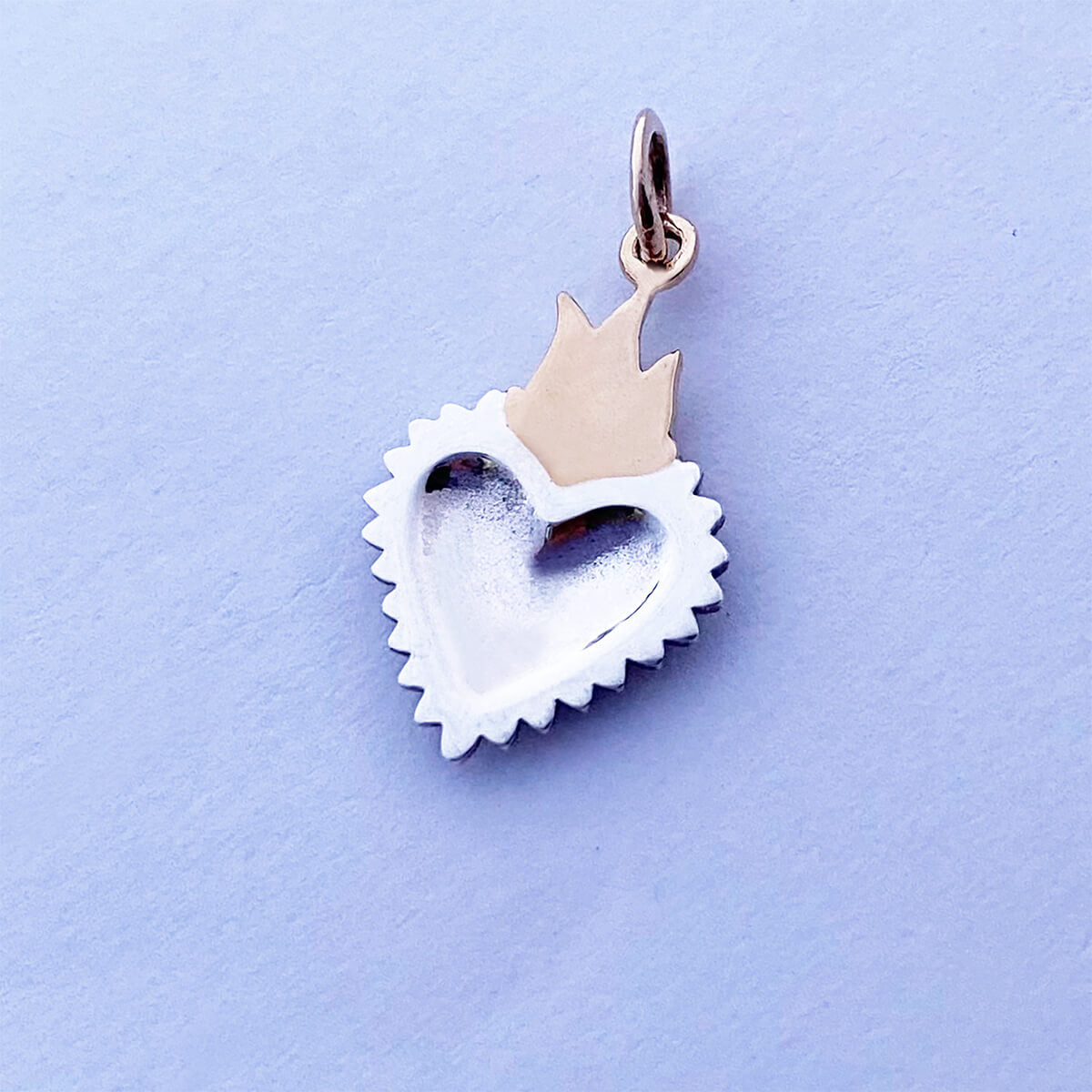 Sacred heart charm reverse