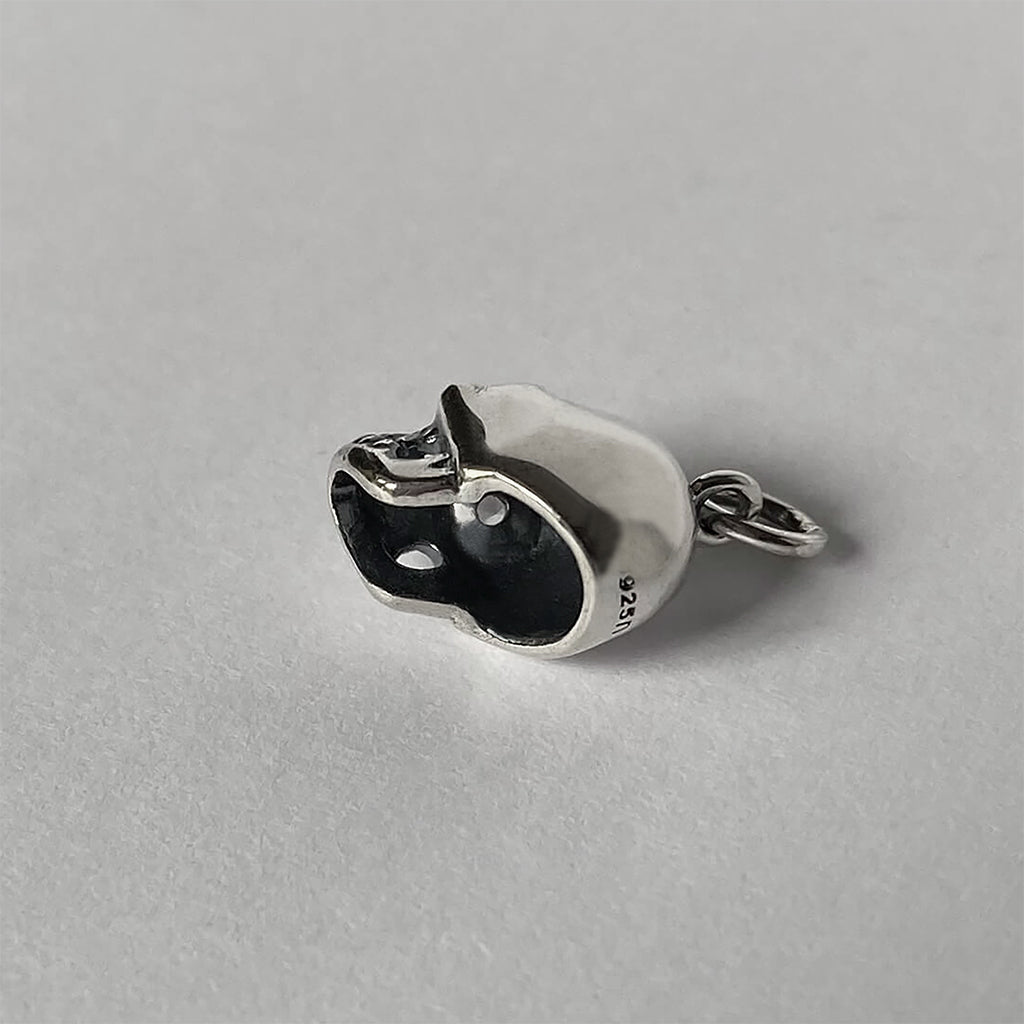 Sterling silver skull charm with crystal eyes