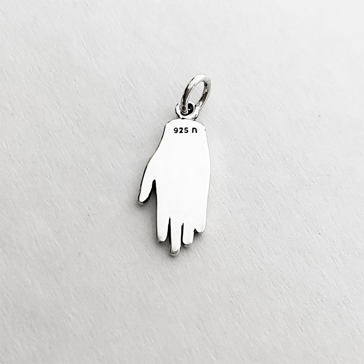 human hand charm left