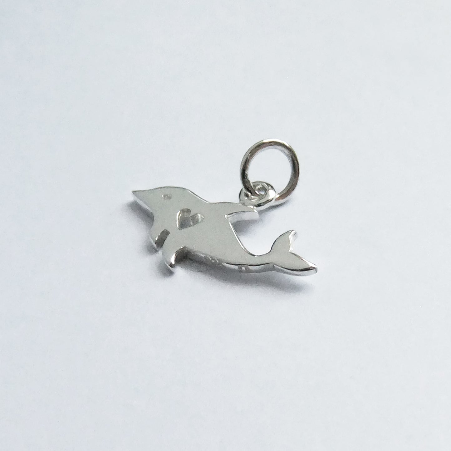 dolphin silhouette with heart charm