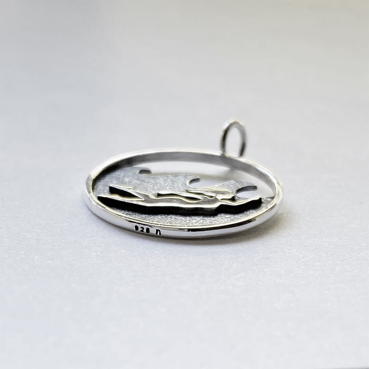 ocean swimmer charm