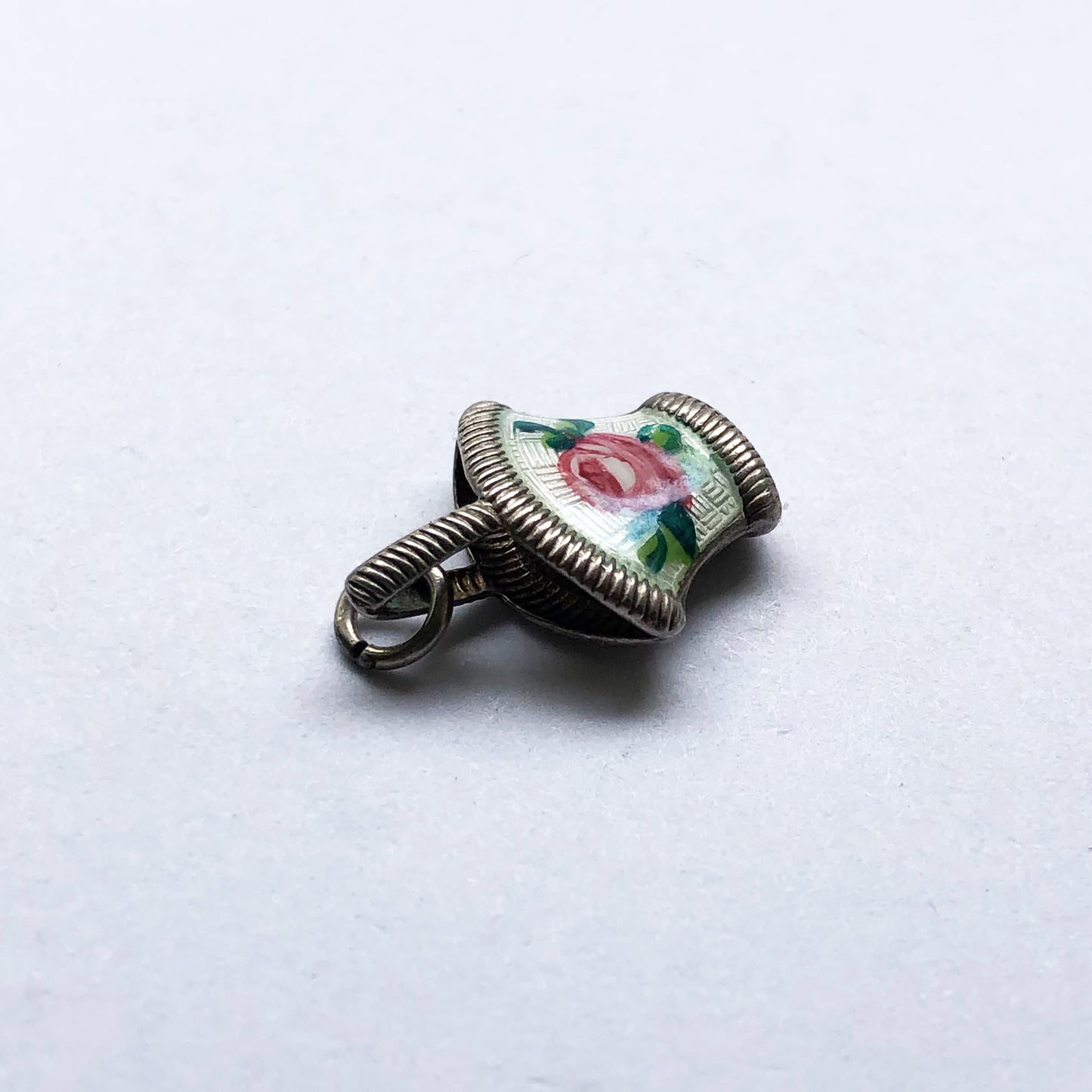 Silver flower basket charm with enamel pink rose