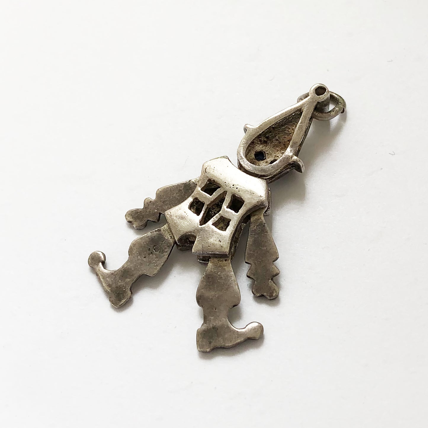Antique articulated clown pendant