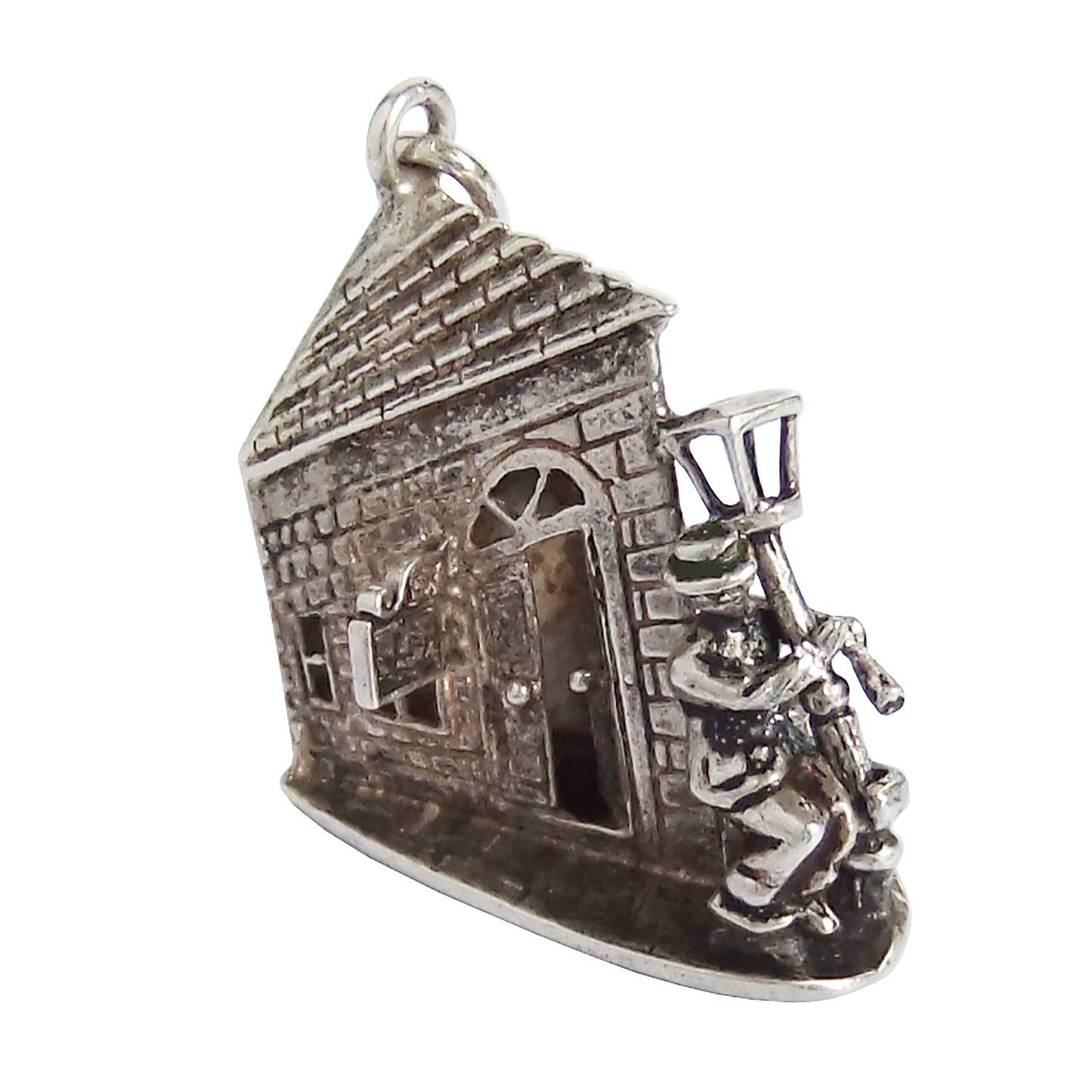Vintage silver drunk on lamppost outside pub charm
