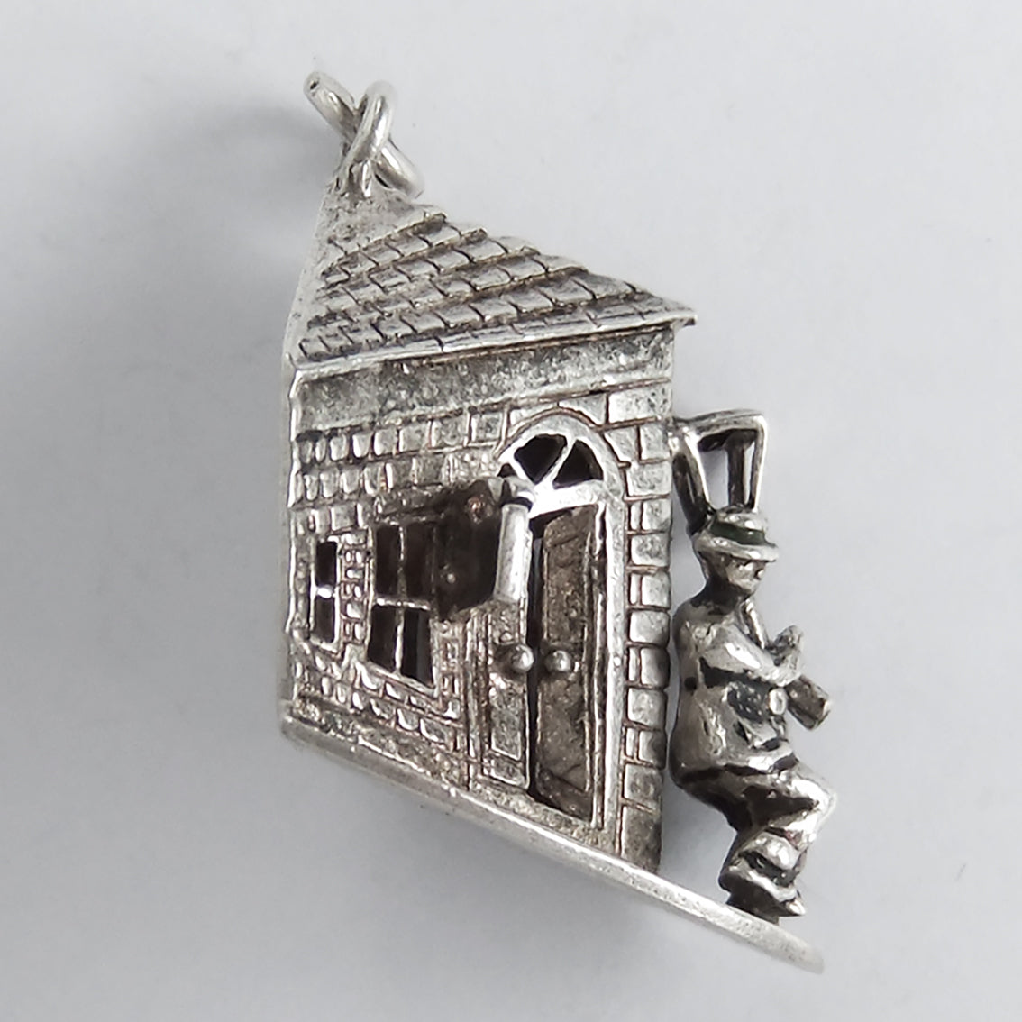 Vintage silver drunk by street light outside public house charm