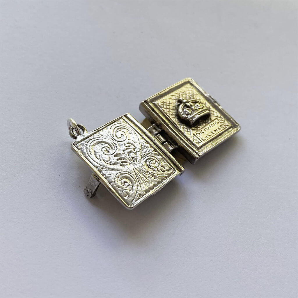 Vintage silver opening driving licence book covers charm with papers inside pendant