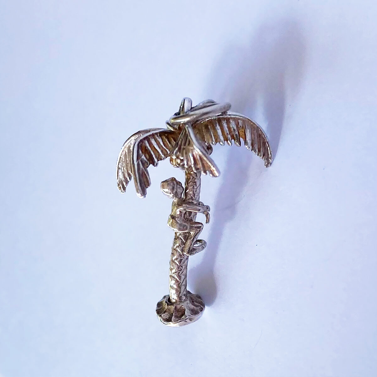 Man Climbing Palm Tree Charm VINTAGE