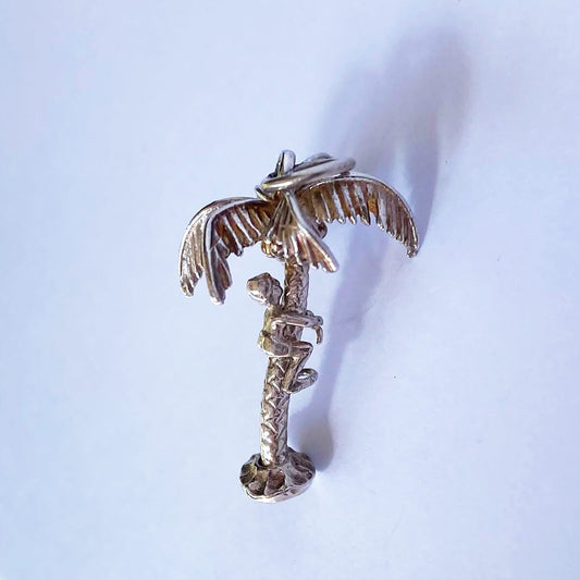 Man Climbing Palm Tree Charm VINTAGE