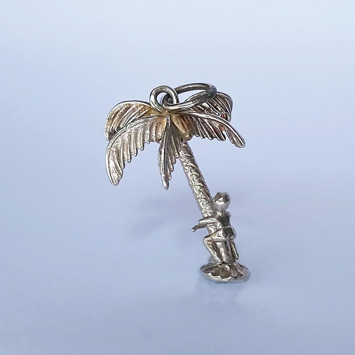 Man Climbing Palm Tree Charm VINTAGE