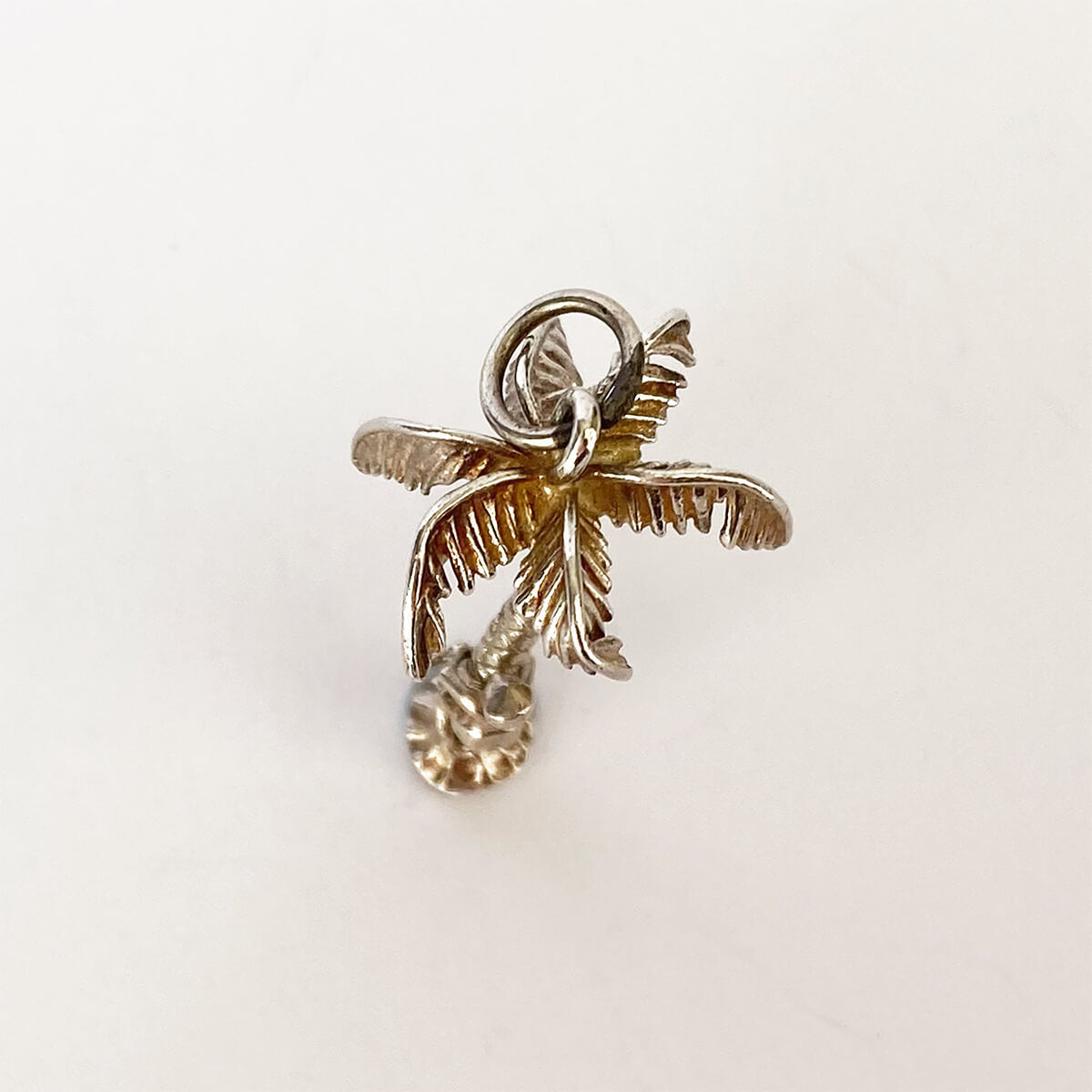 Man Climbing Palm Tree Charm VINTAGE
