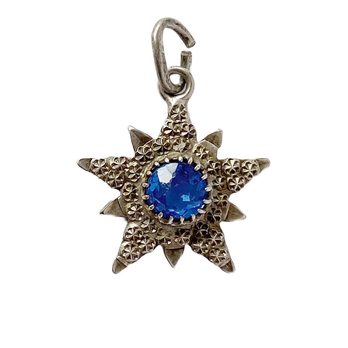 English silver antique star pendant with blue centre stone made in 1904 by Charles Horner