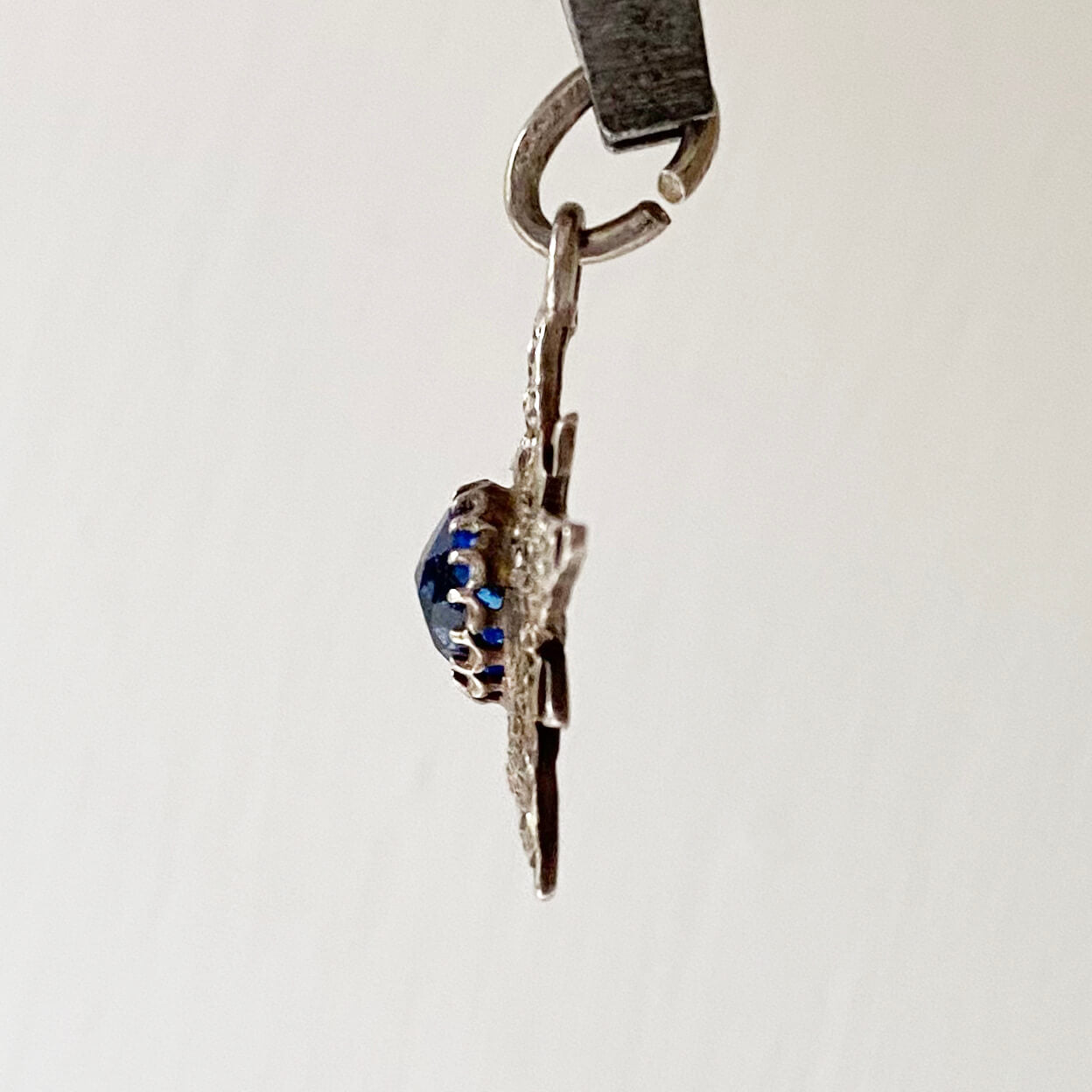English silver antique star pendant with blue centre stone made in 1904 by Charles Horner