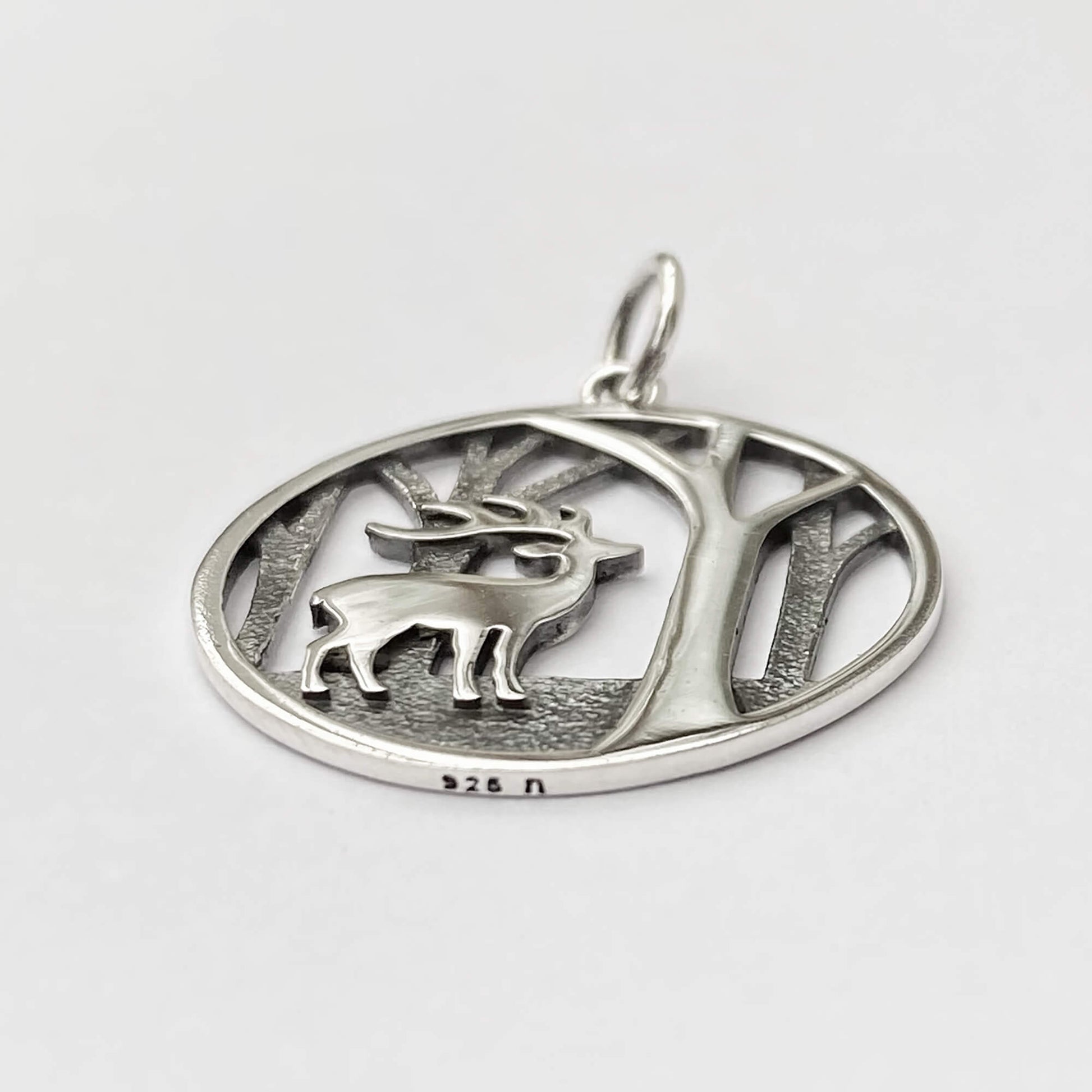 Deer in the woods charm in sterling silver