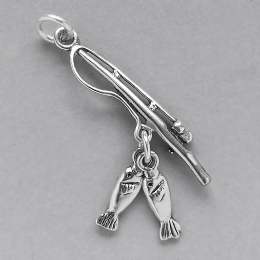 Sterling silver fishing pole and two fish charm on a grey background