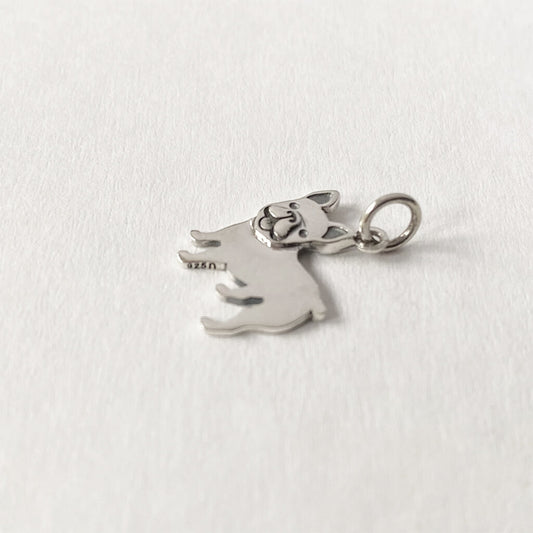Sterling silver French bulldog charm on a white background