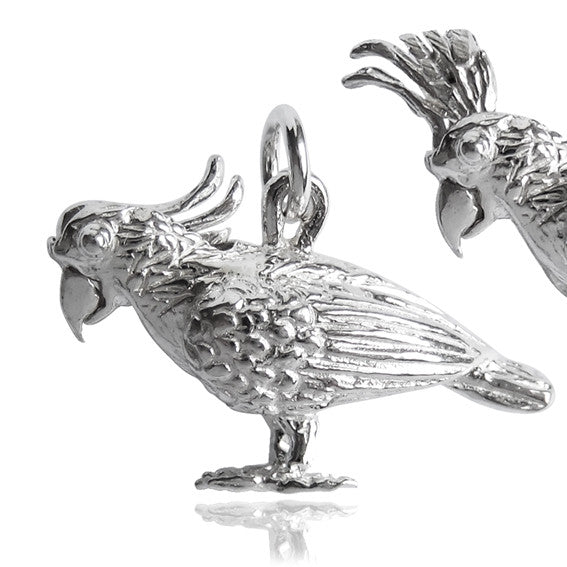cockatoo charm with moving crest on white background