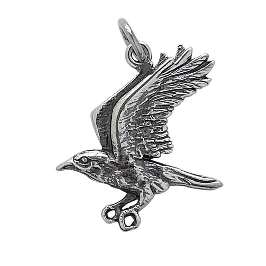 crow in flight charm in sterling silver