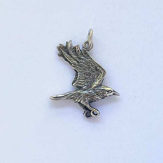 crow in flight pendant in sterling silver