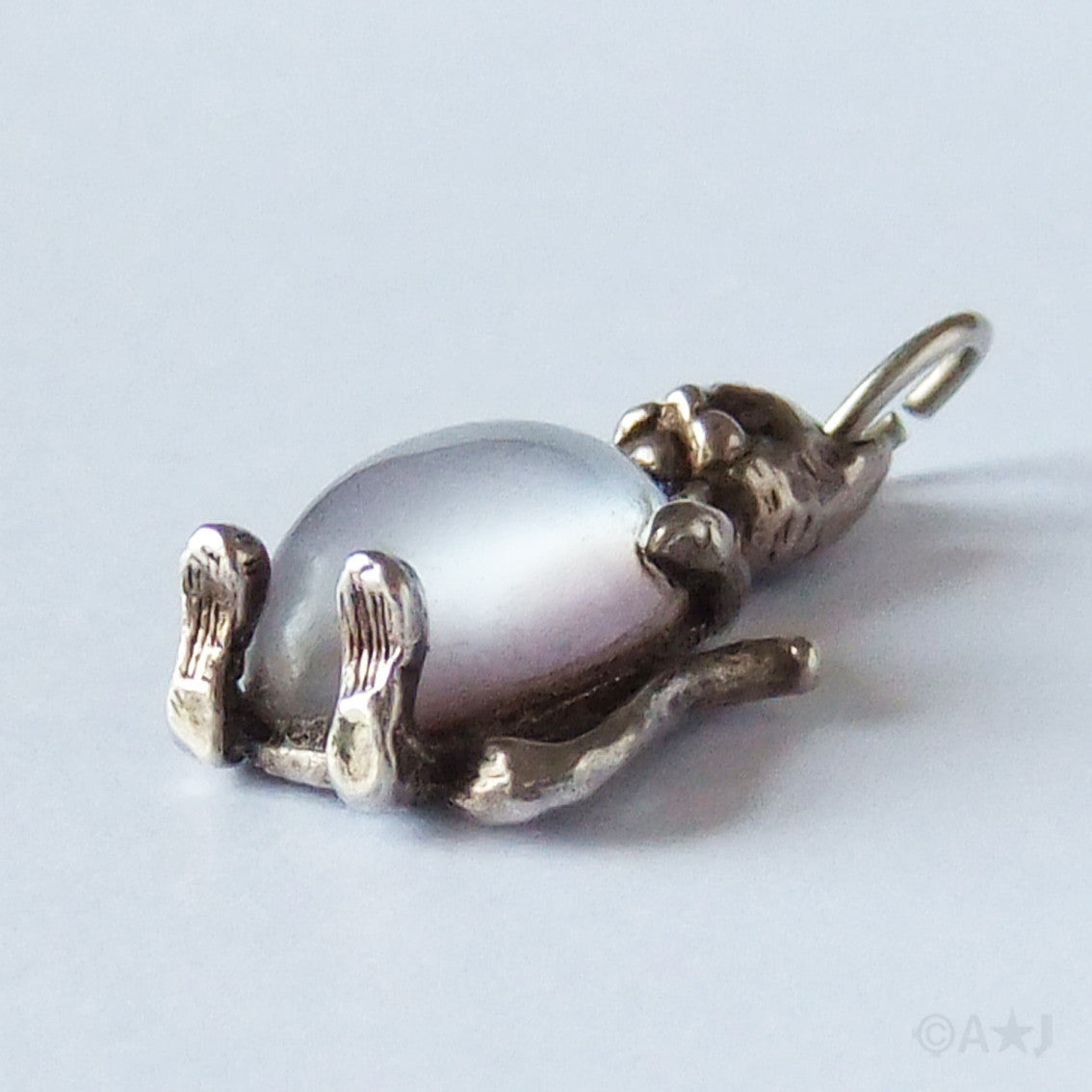 Vintage sterling silver and purple glass cat charm pendant