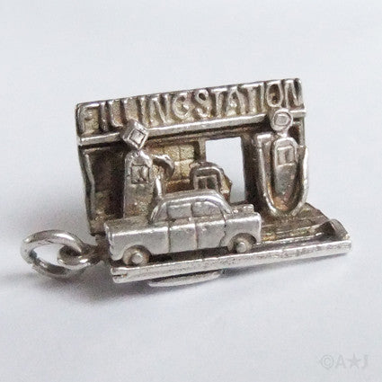 Vintage moving mechanical car fuel petrol filling station charm