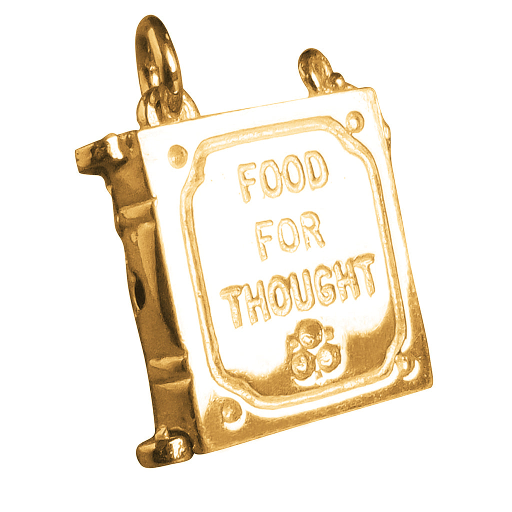 Gold Bookworm in book charm on white background