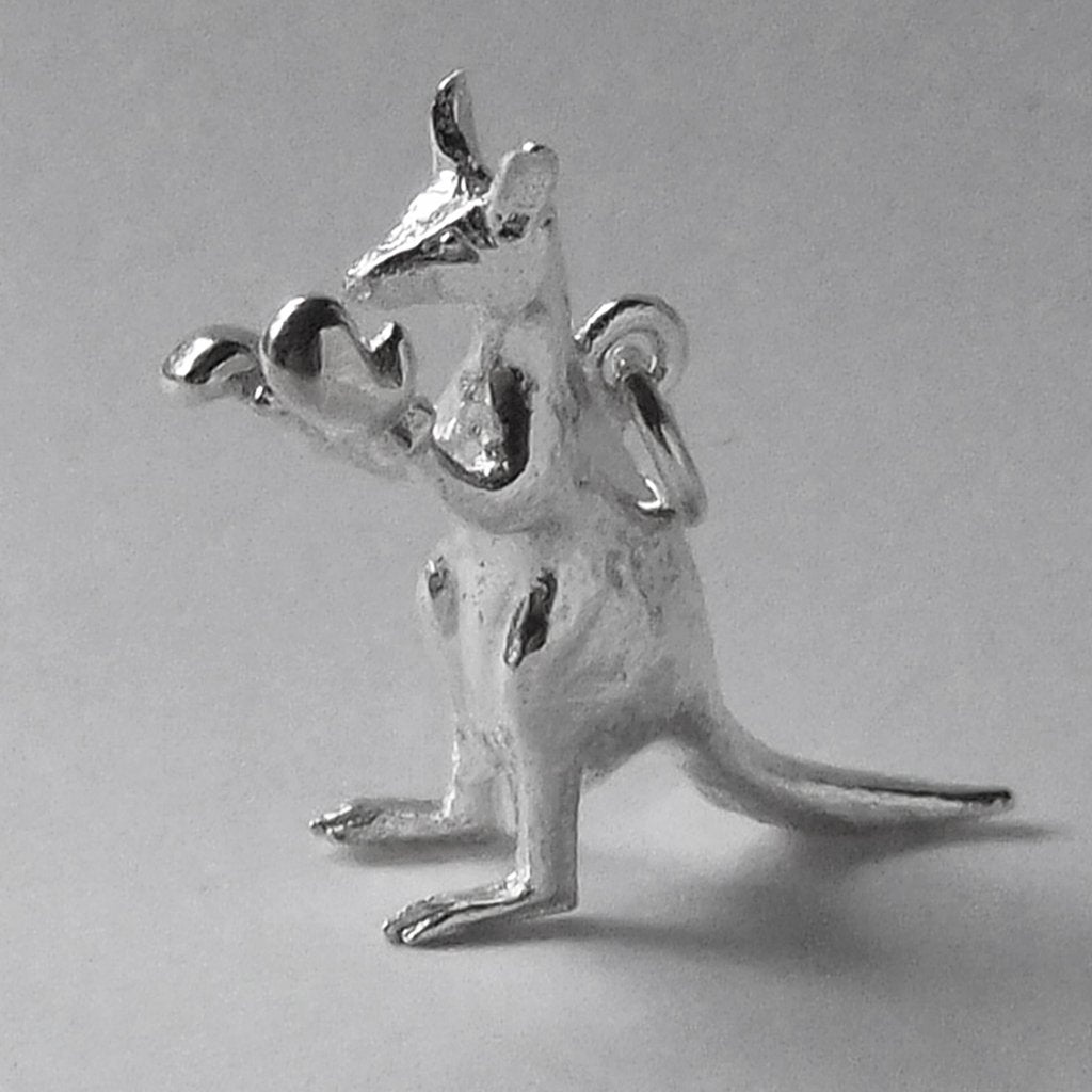 Boxing kangaroo charm in sterling silver on a grey background