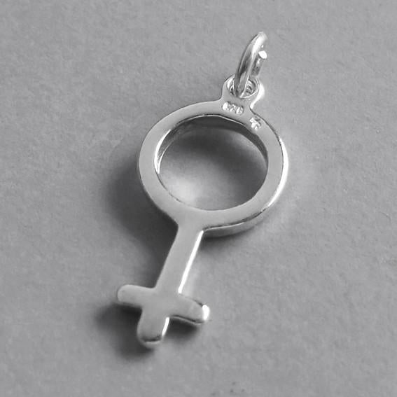 Female gender symbol sign charm sterling silver 925 pendant on grey background
