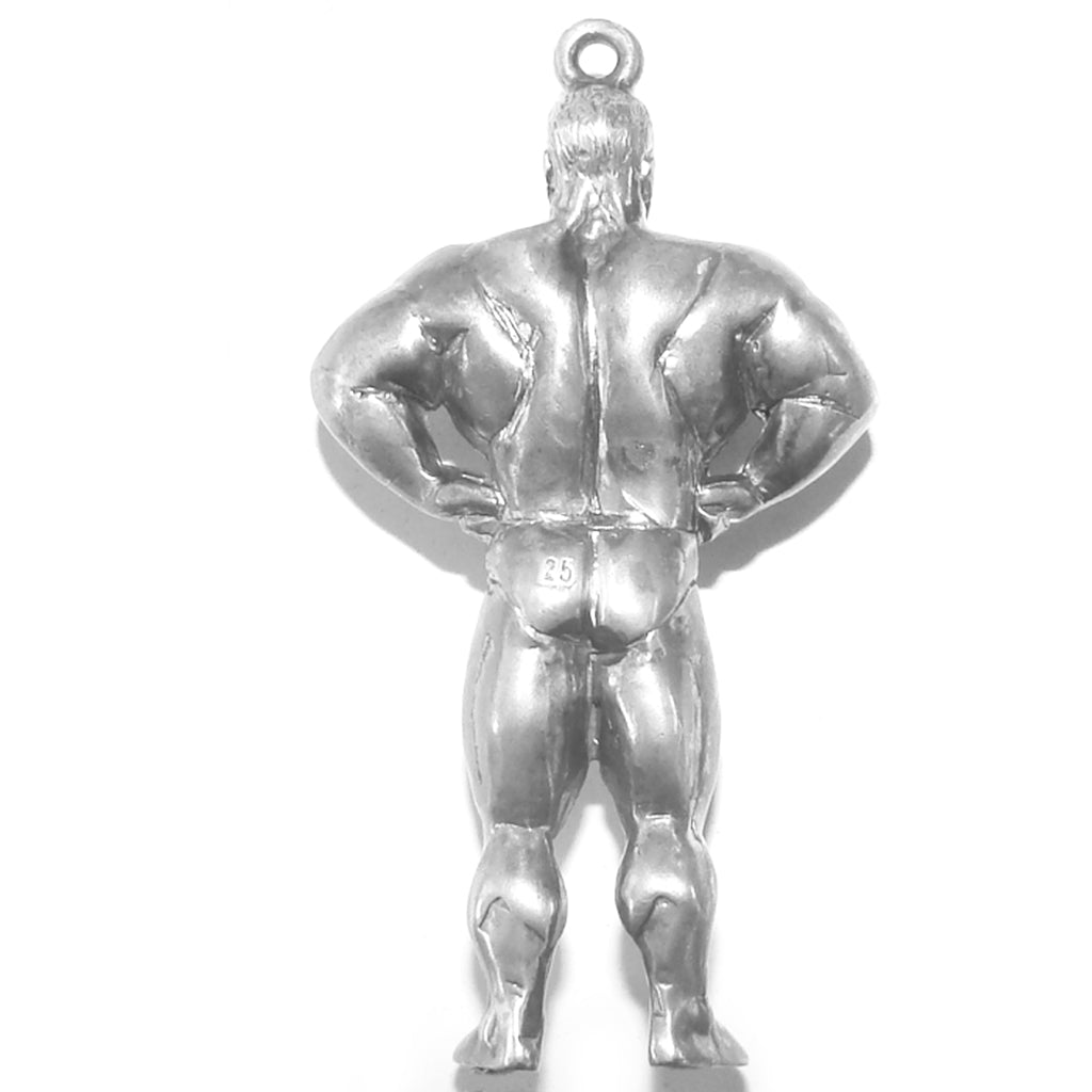 silver muscle man pendant viewed from the back on a white background