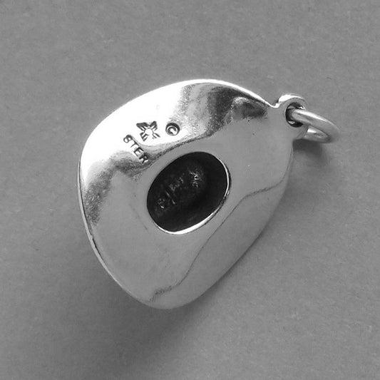 silver cowboy hat charm on grey background