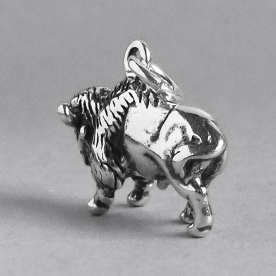 silver buffalo charm pictured from rear on a grey background