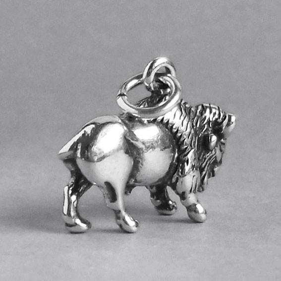 silver buffalo charm pictured from rear on a grey background