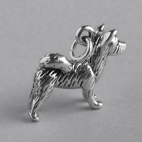 silver akita dog charm side view on grey background