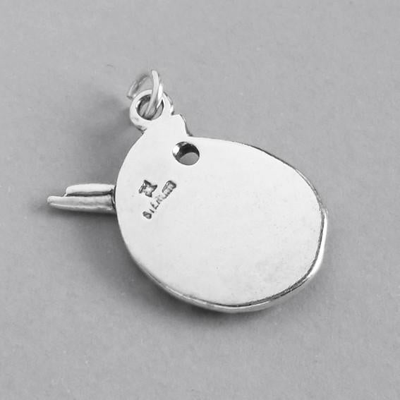 silver paint palette charm viewed from back on grey background