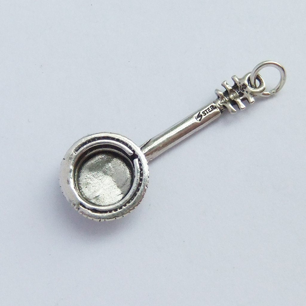 Banjo charm reverse on light grey background